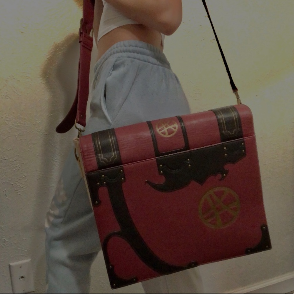 Red,Gold and black bag ( Doctor Strange Book)